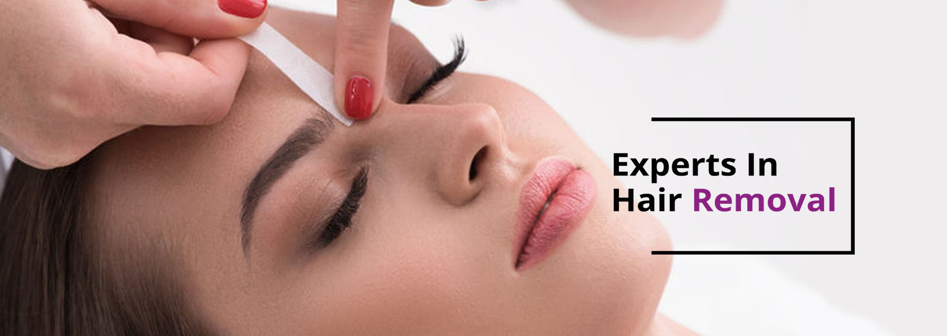 Beautician Waxing A Woman's Leg In Spa
